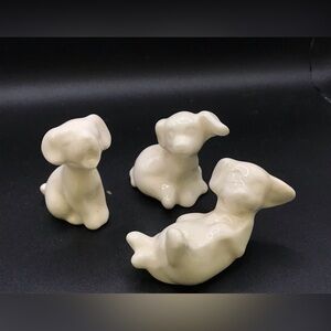 Trio of ceramic white pups #1